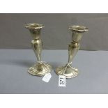 A pair of silver candlesticks each detachable scones, Birmingham 1904