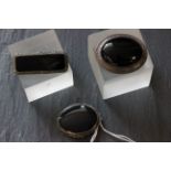 Three hallmarked silver & onyx brooches