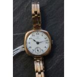 A ladies 1920's 9ct rose gold Omega wrist watch. Serial number 7004583. Case number 6505631.