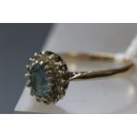 Ladies 9 carat gold, aquamarine and diamond ring