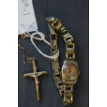 9ct gold crucifix pendant with 9ct gold chain and yellow metal ladies wrist watch