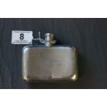 A late Victorian silver hip flask, with a engraved armorial, London 1894, William Summers