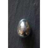 A 19th/20th century Russian silver two section egg, with a silver gilt interior, maker's mark CE