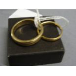 Gents 9ct gold wedding band plus an 18ct gold band
