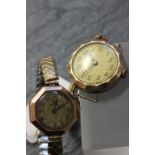 A ladies Record 9 carat gold watch with a expanding bracelet strap, along with one other 9 carat