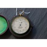Victorian leather cased pocket barometer double sided with compass