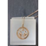 9ct gold Pisces pendant on a 9ct gold necklace