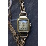 14ct Gold Ladies wristwatch with 9ct gold strap