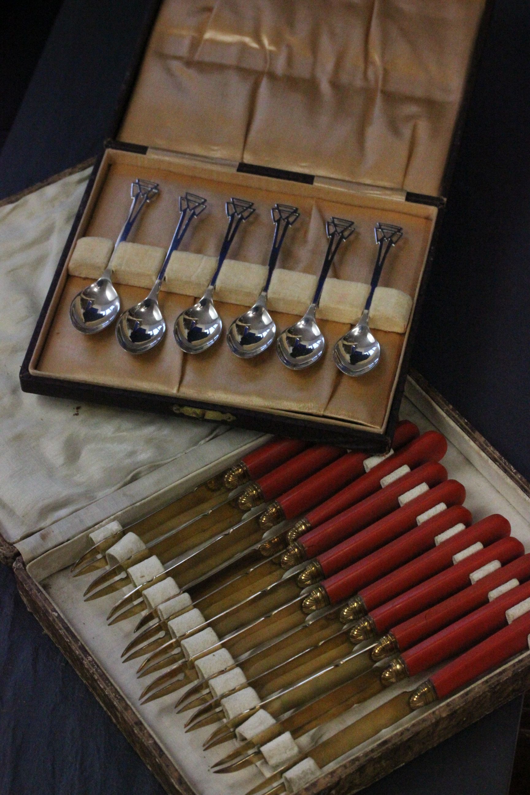 A cased set of silver teaspoons, Sheffield 1939, Edward Viner, along with cased set of knives