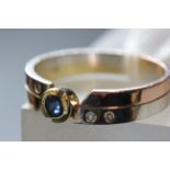 14 carat gold diamond and sapphire ring