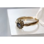 Ladies 9 carat gold diamond and single stone ring