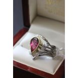 18ct yellow & white rub over set pear shape Rhodolite and claw set Diamond ring. pear shape approx