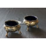 Pair of Victorian hallmarked silver open salt dishes with blue glass liners, 1872