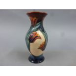 Moorcroft Pottery Red Tulip Returns vase of baluster form designed by Sian Leeper, painted mark to