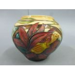 Moorcroft Pottery Hartring vase decorated with stylized butterfly and caterpillar, printed and