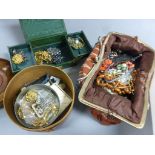 Quantity of costume jewelry brooches fabric clutch bag leather collar case etc