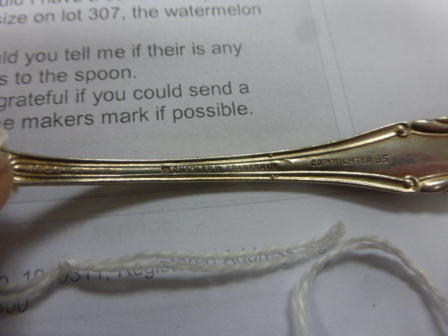 An American silver and enamelled spoons, by Charles W Cranshaw, the handle cast as a black boy and - Image 3 of 3