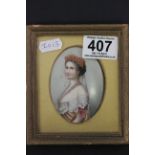 a framed miniature portrait painting of a 19th century lady wearing tiara