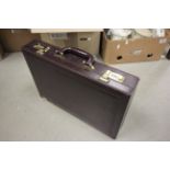 A contemporary leather combination attache case