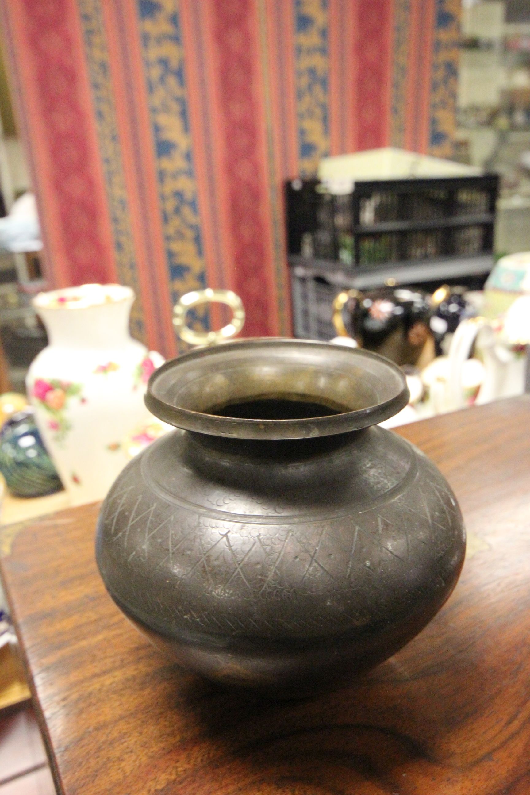 A small antique bronze vase