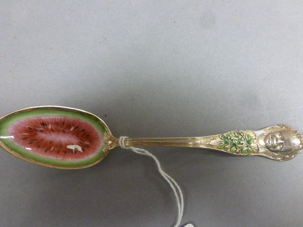 An American silver and enamelled spoons, by Charles W Cranshaw, the handle cast as a black boy and