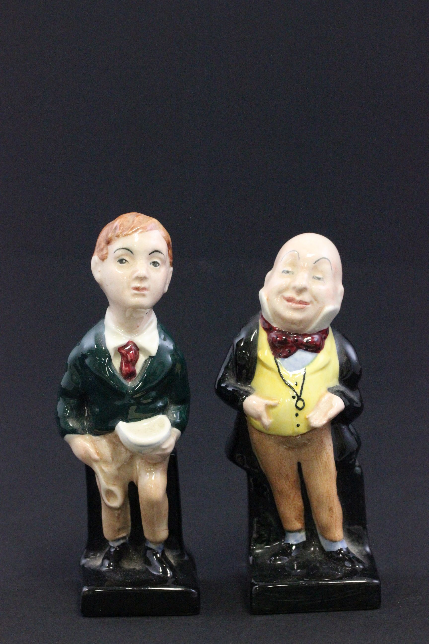 Pair of Royal Doulton Charles Dickens figurines Oliver Twist & Micawber