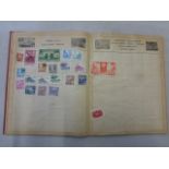 Stamp album with a quantity of world stamps hinged