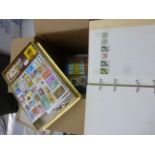 Carton of stamps with Ace stamp album, quantity of world stamps on 7 off paper plus Typhoo