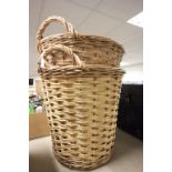 Two wicker log baskets