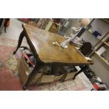 Early 20th century Oak Draw-leaf Table, the top with herringbone pattern and raised on carved