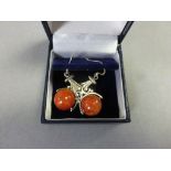 Pair of Silver and Apple Coral Art Deco Style Revolving Ball Earrings