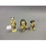 Three netsuke style carvings to include Lady with gold