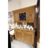 Early 20th century French Walnut Dresser, the upper section with blue glazed door