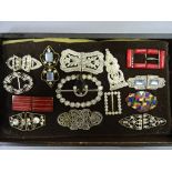 Tray of vintage costume jewellery buckles