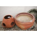 Large Circular Clay Planter and another Planter