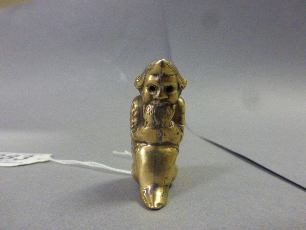 Brass Cased Vesta in the form of a Seated Child
