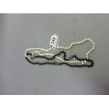 Balck and White Cultured Pearl Necklace of Opera Length with Chanel Style Spacers