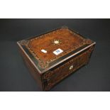 A Victorian walnut and inlaid sewing box