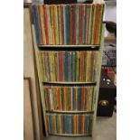 Wooden Bookcase containing a large collection of Vintage Ladybird Books