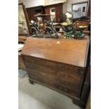 Large Early 19th century Mahogany Bureau, the hinged front revealing fitted interior above four long