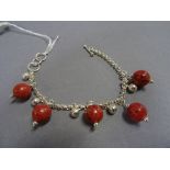 Silver and Apple Coral Bracelet