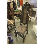 17th century Stye Heavily Carved Oak Hall Chair with Bergere Back and Seat