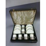 Boxed Set of Six Crown Staffordshire Coffee Cups and Saucers with Hallmarked Silver Holders