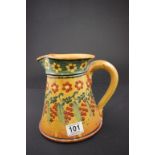 A 19th century silpware jug, decorated in an autumn pattern