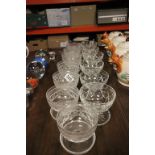 Thirteen Cut Glass Grapefruit Bowls