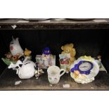 A collection of 7 pieces of Aynsley Nursery Rhyme items to include money boxes, clock, mug and egg