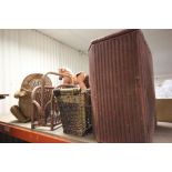 A Lloyd loom basket, along with a wicker basket, magazine rack and waste paper bin in the form a