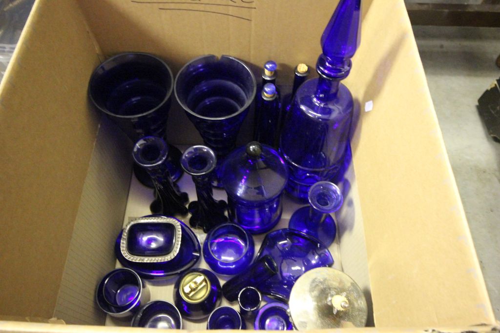 A collection of Bristol blue glass including decanters