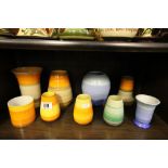 A collection of 8 Shelley vases, various colours and sizes