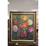 A modern oil on canvas of flowers signed lower left Lamah